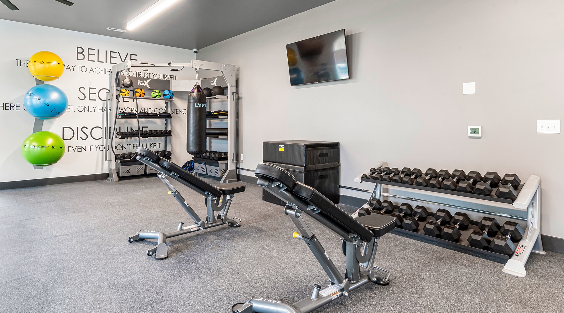 Fitness Center Large fitness center with ample amount of equipment.