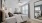 Bright and spacious bedroom at Aldon at Powell & Broad, showcasing a ceiling fan and large windows that let in natural light in Fuquay-Varina, NC.